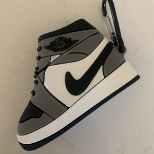 AirPod case, Air Jordan inspired. Black, gray and white.